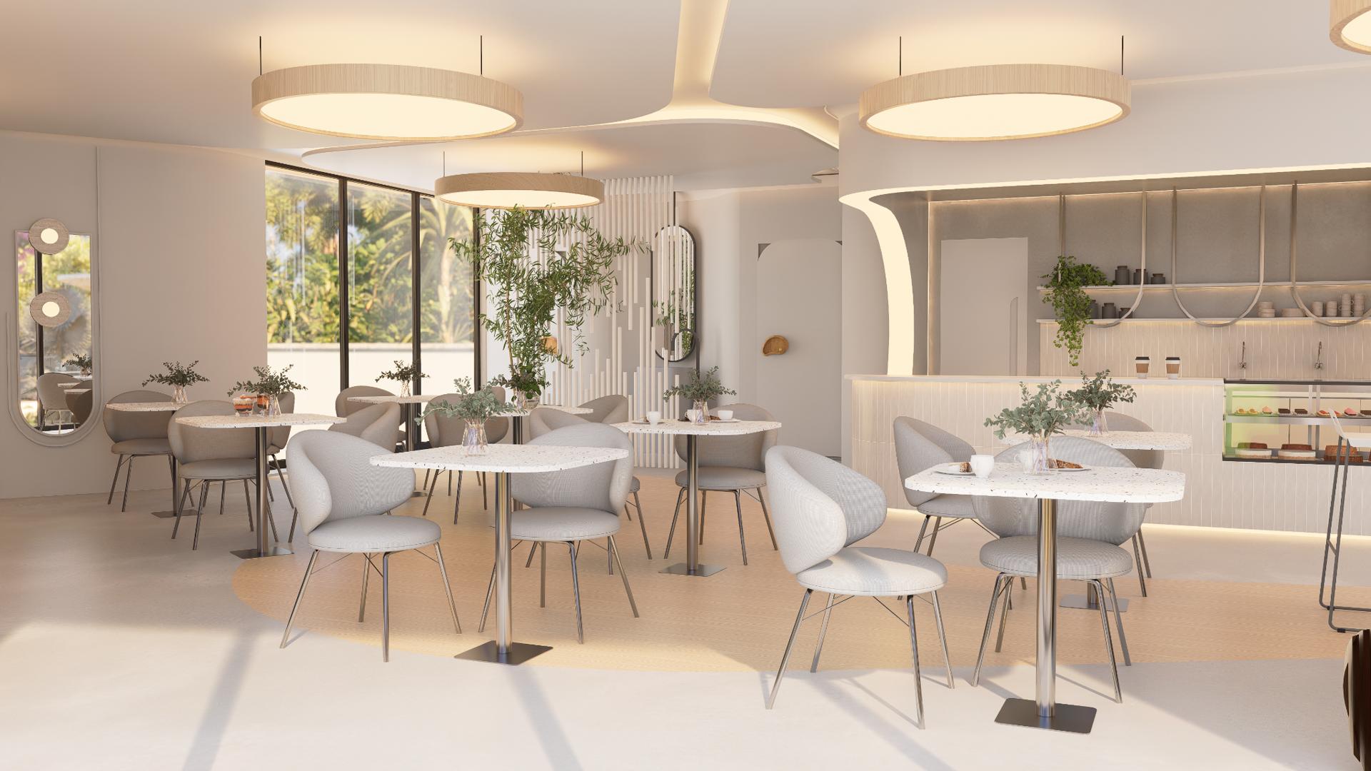 Cafeteria do L'essence, com balcao e vidraca voltada para o centro olimpico