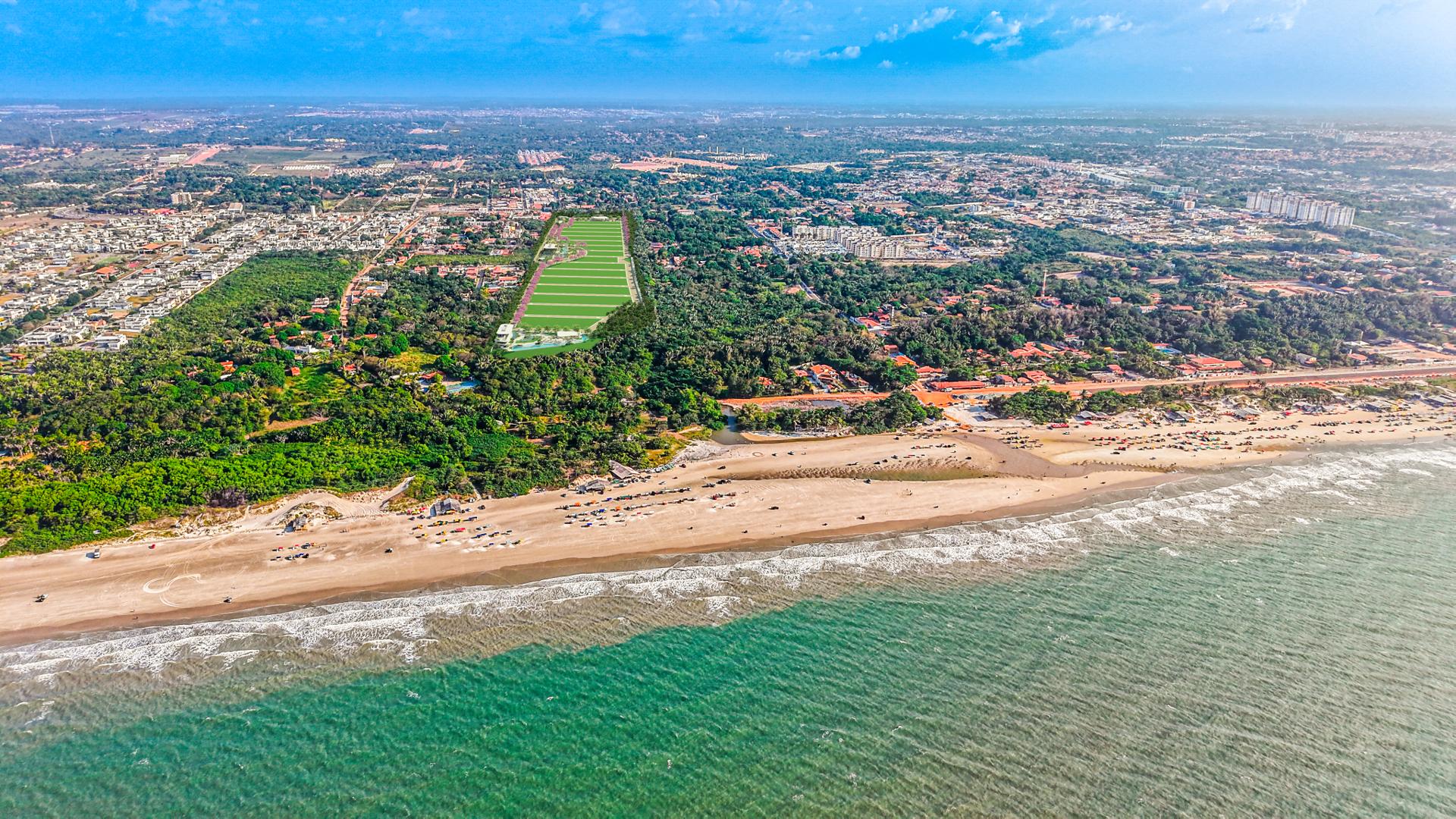Vista aerea de Aracagy, com a mata nativa preservada de um lado e a orla do outro