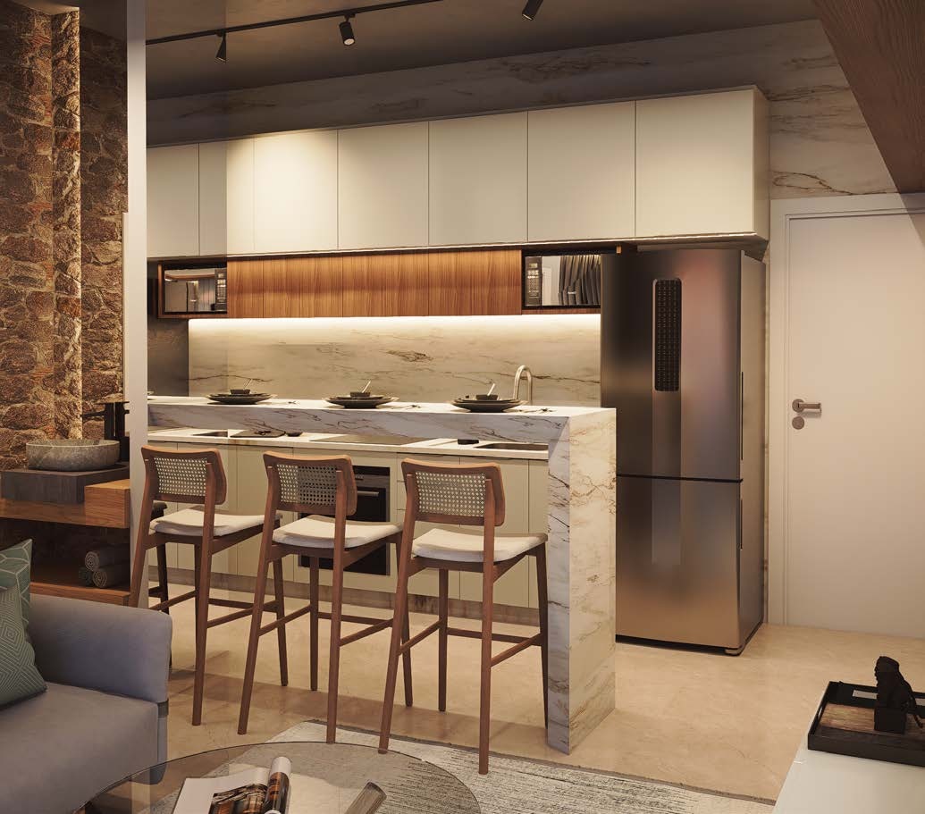 Living do apartamento com bancada e cozinha integrada